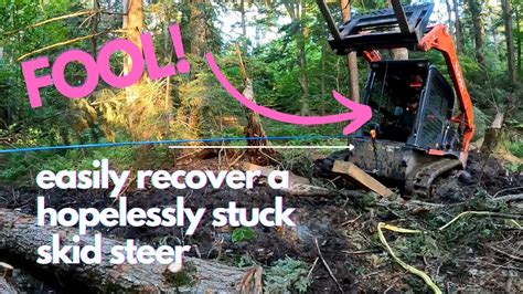 getting skid steer stuck out of work|how to unstuck a skid steer.